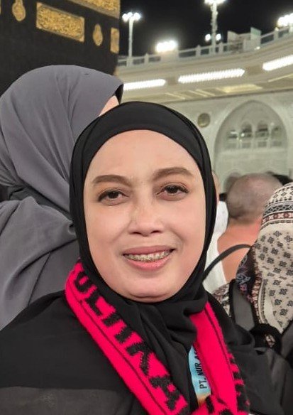 SRI SUHARTINI